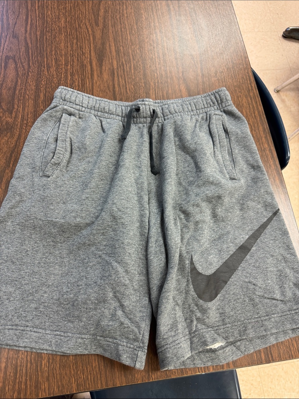 Nike Men’s Gray Athletic Shorts with Black Swoosh